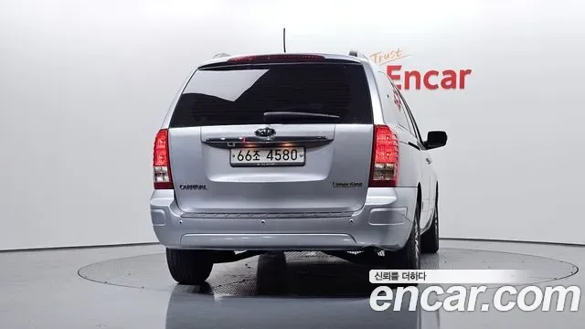 Kia Canival Carnival R, 2010 — фото 4